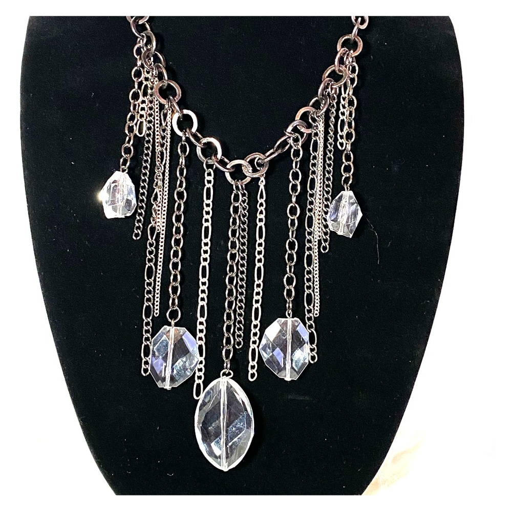 Bib style fashion necklace in gunmetal color.